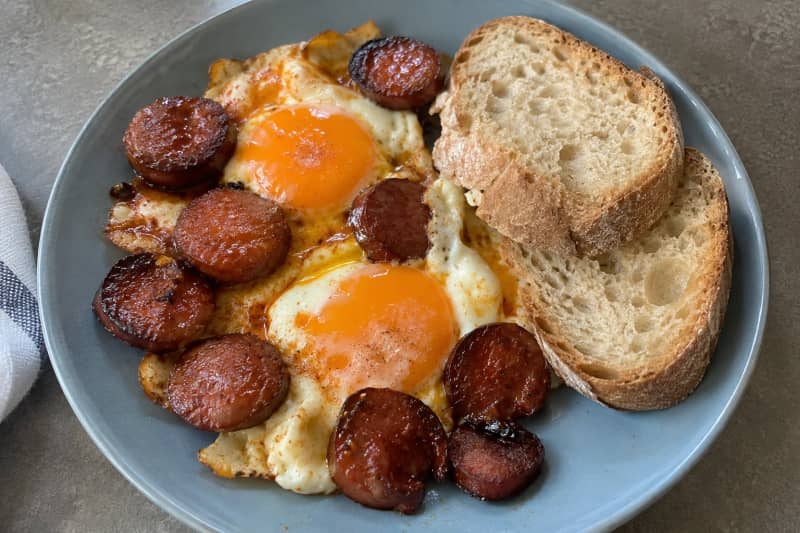 Eggs with chouriço (Portuguese pork sausage) and rustic bread