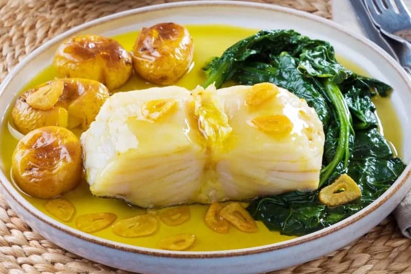 Bacalhau à lagareiro (roasted cod with potatoes and garlic)